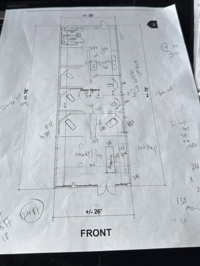 Hand-marked floor plan for a sim racing center, 26 by 76 feet, with rigs along both walls